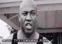 A Bald Man Is Saying " That 'S My Bike Punk " GIF