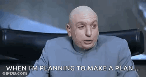 A Bald Man Is Sitting In A Chair And Saying `` When I 'M Planning To Make A Plan . `` GIF