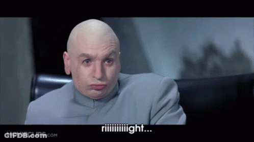 A Bald Man Is Sitting In A Chair With Movieclips.com Written On The Bottom GIF