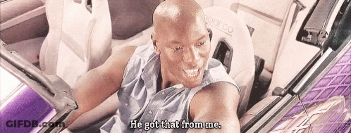 A Bald Man Is Sitting In The Back Seat Of A Car . GIF