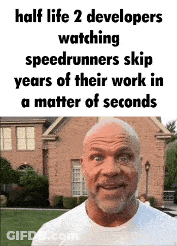 A Bald Man Is Standing In Front Of A Brick Building With A Caption That Says Half Life 2 Developers Watching Speedrunner GIF