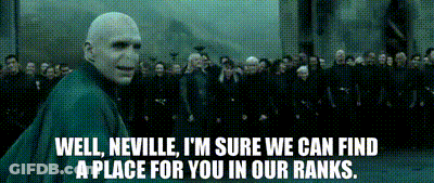 A Bald Man Is Standing In Front Of A Crowd And Says Well Neville I 'M Sure We Can Find A Place GIF