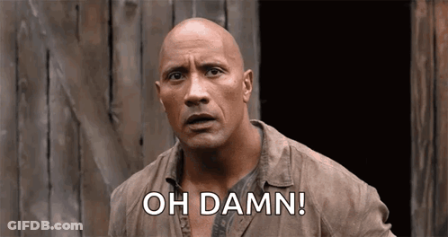 A Bald Man Is Standing In Front Of A Wooden Building And Saying `` Oh Damn ! '' GIF