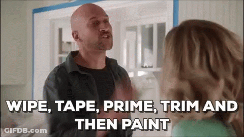 A Bald Man Is Talking To A Woman In A Kitchen And Saying `` Wipe , Tape , Prime , Trim And Then Paint '' GIF