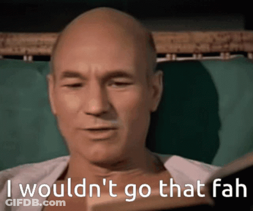 A Bald Man Reading A Book With The Words " I Wouldn 'T Go That Fah " On The Bottom GIF