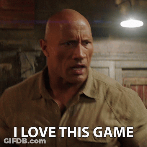 A Bald Man Says I Love This Game In Front Of A Light GIF
