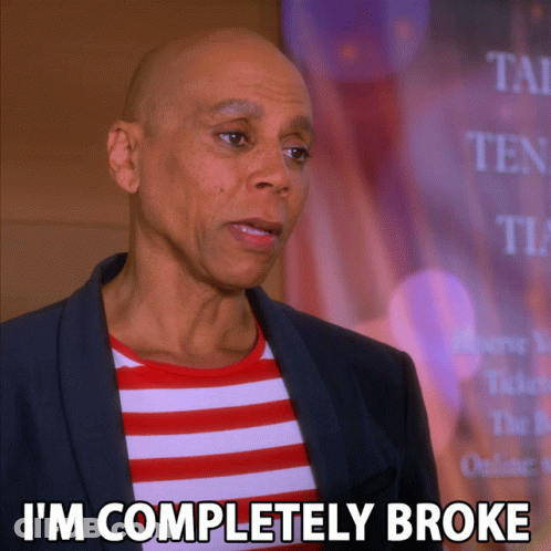 A Bald Man Says I 'M Completely Broke While Wearing A Striped Shirt GIF