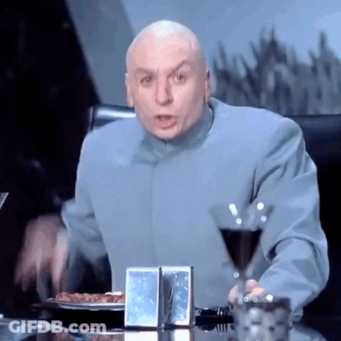 Bald Man Sitting With Glass Of Wine GIF