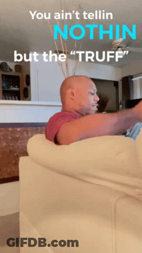 A Bald Man Sitting On A Couch With The Words " You Ain 'T Tellin Nothin But The Tuff " GIF