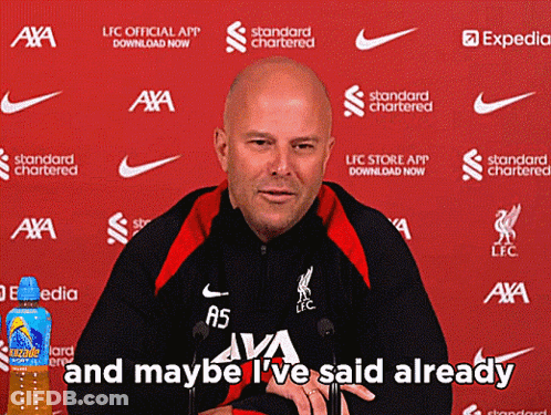 A Bald Man Stands In Front Of A Red Backdrop With The Words And Maybe I 'Ve Said Already GIF