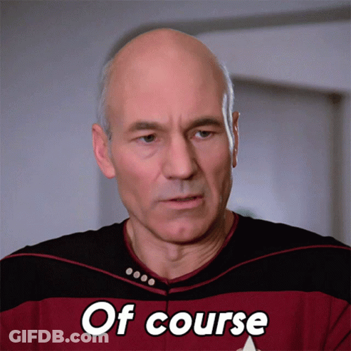 A Bald Man Wearing A Shirt That Says Of Course On It GIF
