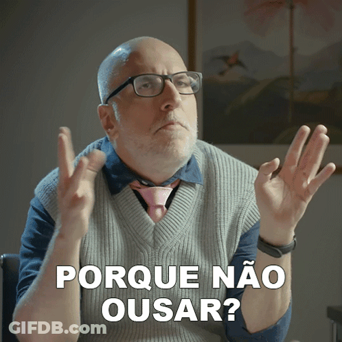 A Bald Man Wearing Glasses And A Pink Tie Says Porque Não Ousar GIF