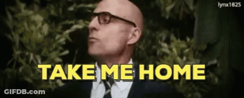 A Bald Man Wearing Glasses And A Suit Says Take Me Home GIF