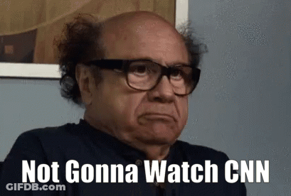 A Bald Man Wearing Glasses Is Making A Funny Face And Says Not Gonna Watch Cnn GIF