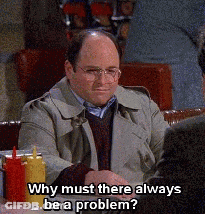 Bald Man With Glasses Sitting At Table Talking GIF