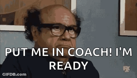 A Bald Man Wearing Glasses Is Sitting In A Chair And Saying `` Put Me In Coach ! I 'M Ready '' GIF