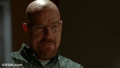 A Bald Man Wearing Glasses Stands In Front Of A Sign That Says Absolutely Not GIF
