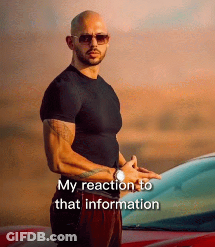 A Bald Man Wearing Sunglasses And A Black Shirt Stands In Front Of A Car With The Words " My Reaction To That Informatio GIF
