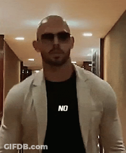 A Bald Man Wearing Sunglasses And A Black Shirt That Says No GIF