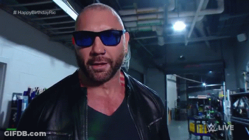 A Bald Man Wearing Sunglasses And A Leather Jacket With The Words Happy Birthday Ric On The Bottom GIF