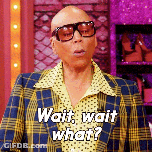 A Bald Man Wearing Sunglasses And A Plaid Jacket Says Wait Wait What . GIF