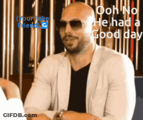 A Bald Man Wearing Sunglasses And A White Jacket Says " Ooh No He Had A Good Day " GIF