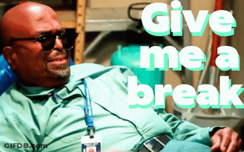 A Bald Man Wearing Sunglasses Sits In A Chair And Says Give Me A Break GIF