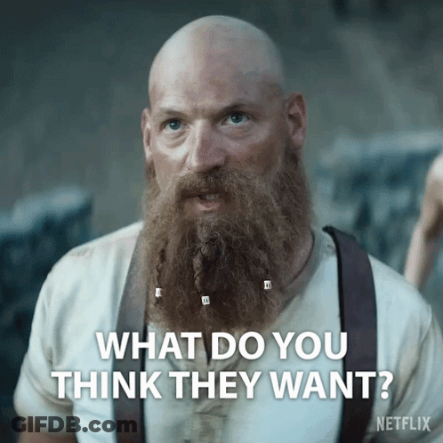 A Bald Man With A Beard And Suspenders Says What Do You Think They Want GIF
