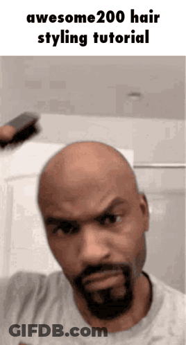 A Bald Man With A Beard Is Brushing His Hair With A Brush And Says Awesome200 Hair Styling Tutorial GIF