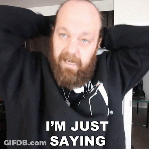 A Bald Man With A Beard Is Holding His Hands Behind His Head And Says I 'M Just Saying GIF