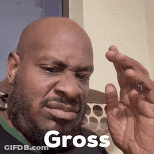 A Bald Man With A Beard Is Holding Something In His Hand And The Word Gross Is On His Face GIF