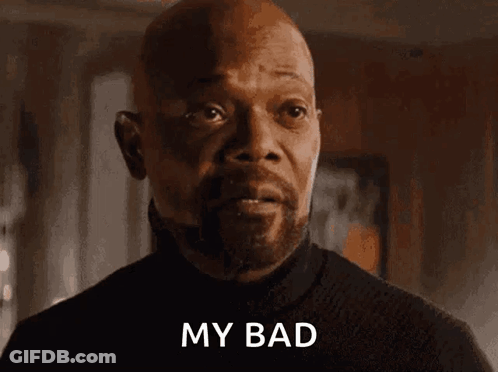 A Bald Man With A Beard Is Looking At The Camera And Saying `` My Bad '' . GIF
