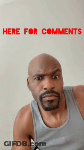 A Bald Man With A Beard Is Making A Funny Face In Front Of A Sign That Says " Here For Comments " GIF