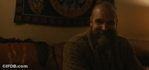 Bearded Man Sitting On Couch With So Filled Words GIF