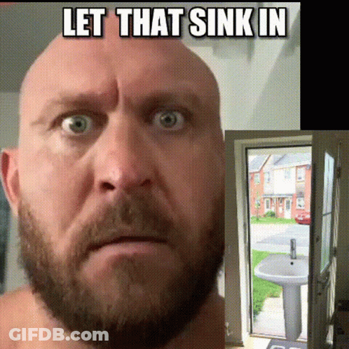 A Bald Man With A Beard Is Standing In Front Of A Sink With The Words Let That Sink In Above Him GIF