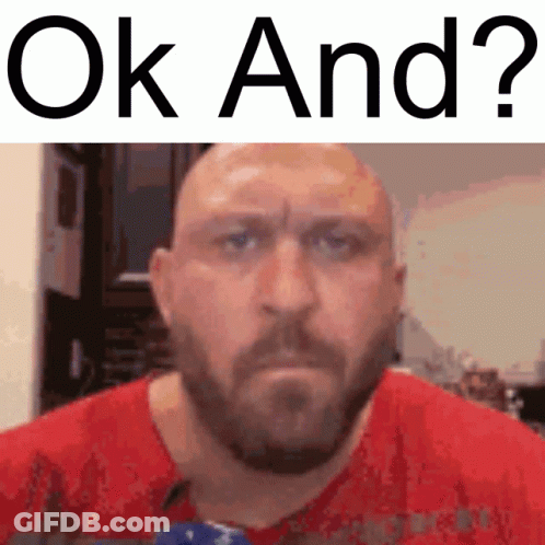 A Bald Man With A Beard Is Wearing A Red Shirt With The Words Ok And Written Above Him GIF