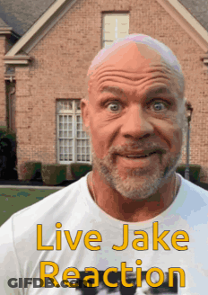 A Bald Man With A Beard Is Wearing A White Shirt That Says Live Jake Reaction On It GIF