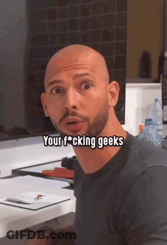 A Bald Man With A Beard Says Your F * Cking Geeks In Front Of A Computer GIF