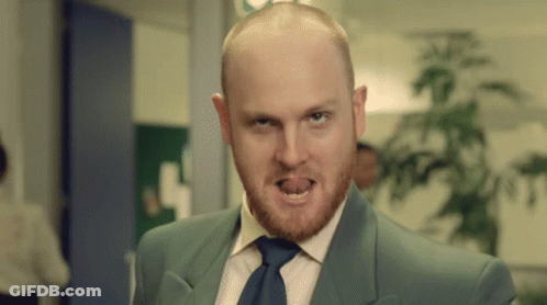 Bald Man With Beard Making Funny Face GIF
