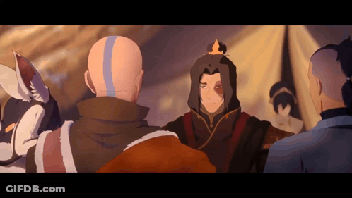 A Bald Man With A Crown On His Head Is Surrounded By Other Men GIF