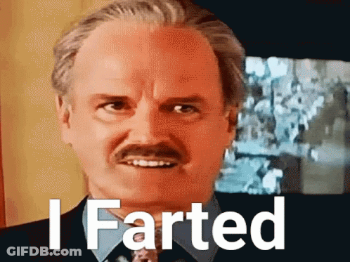 A Bald Man With A Mustache And The Words I Farted Behind Him GIF