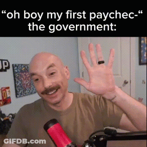 A Bald Man With A Mustache Is Waving His Hand In Front Of A Microphone While Talking Into It . GIF