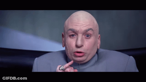 A Bald Man With A Ring On His Finger Is Pointing GIF