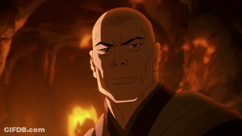 A Bald Man With A Serious Look On His Face Is Standing In Front Of A Fire GIF