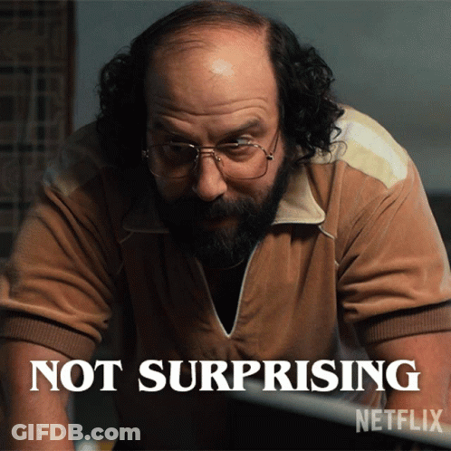 A Bald Man With Glasses And A Beard Says Not Surprising GIF