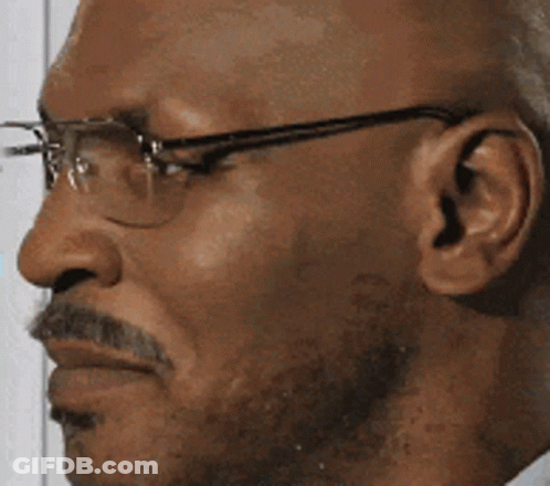 A Bald Man With Glasses And A Mustache GIF