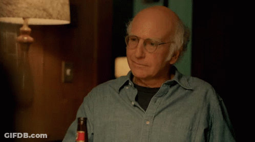A Bald Man With Glasses Is Holding A Bottle Of Beer And Saying Eh GIF