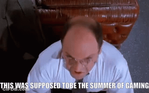 A Bald Man With Glasses Is Sitting In Front Of A Leather Couch And Says This Was Supposed To Be The Summer Of Gaming GIF