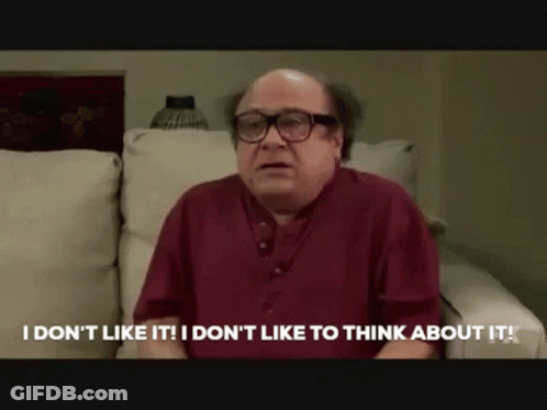 A Bald Man With Glasses Is Sitting On A Couch And Saying " I Don 'T Like It " GIF