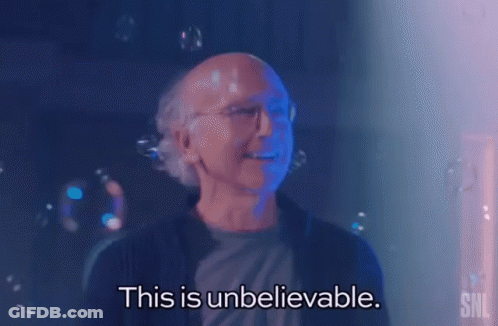 A Bald Man With Glasses Is Surrounded By Soap Bubbles And Says This Is Unbelievable . GIF